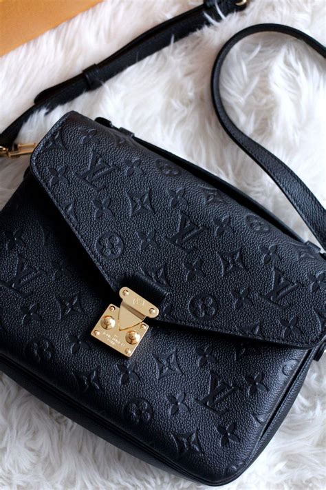 black louis vuitton diane bag.